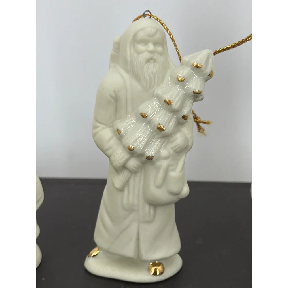 Set of 4 Vintage Bisque Porcelain Santa Claus Figurines Gold Accents Ornaments